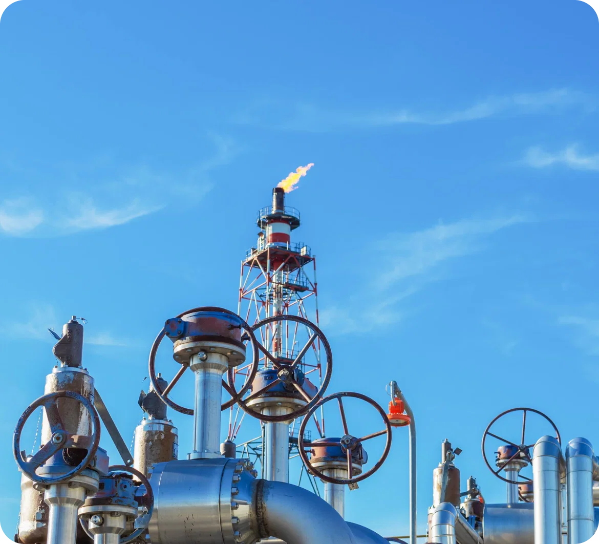Natural gas pipeline valves and flare stack at a processing facility